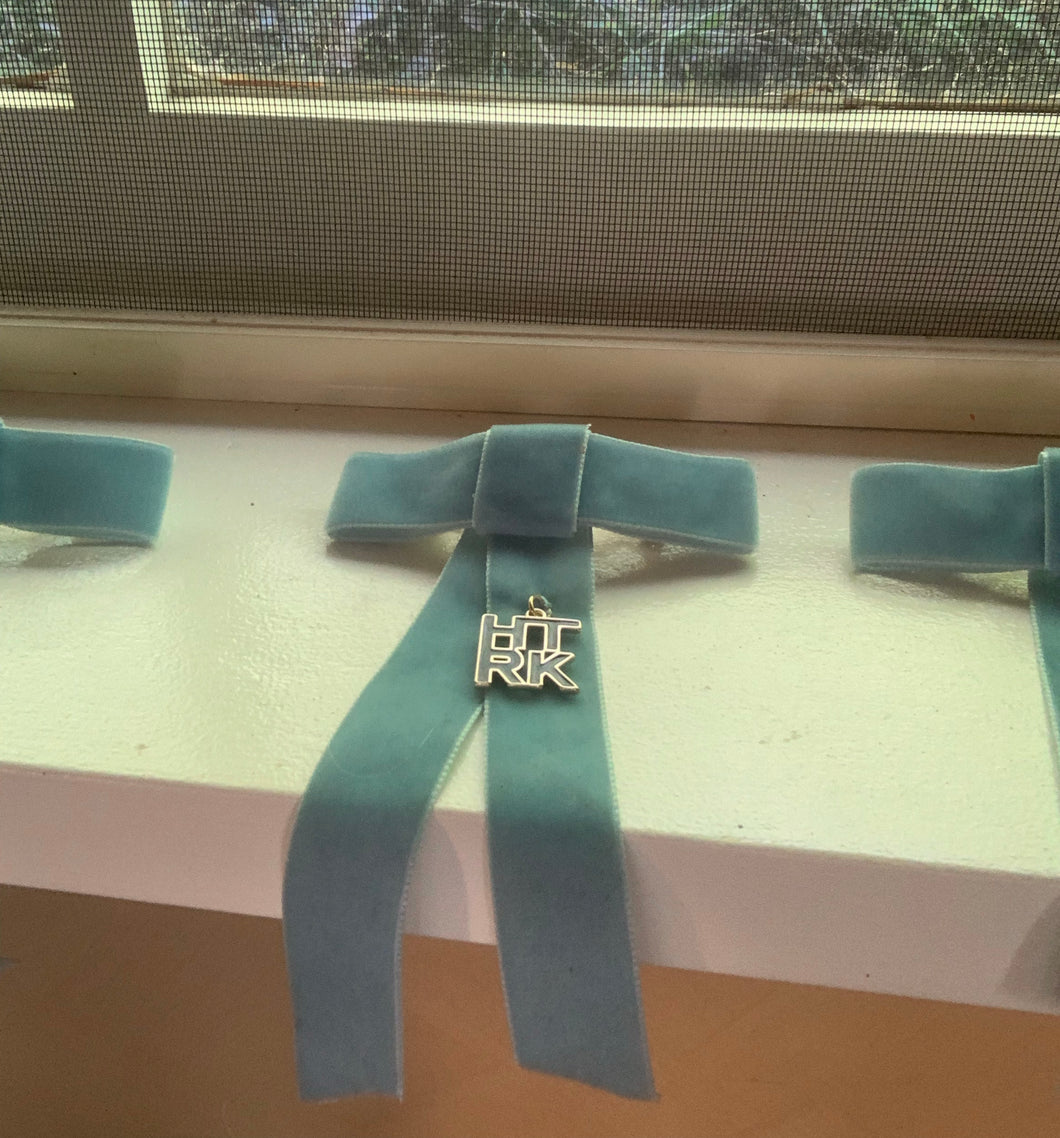 Velvet bow barrette with HTRK charm